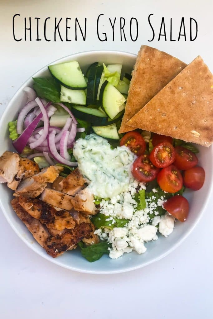 Filling, Fresh, and Flavorful. All the flavors of a gyro, but in salad form. Marinated grilled chicken packs a protein punch and n easy, homemade tatziki sauce pulls everything together. Serve the salad family style and let everyone assemble their own bowls. #KathleensCravings #Greeksalad #GreekGyroSalad #GrilledChickenSalad #GrilledGreekChicken