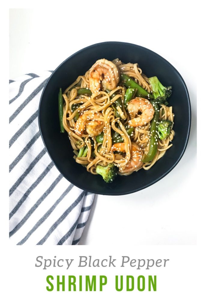Less than 30 minutes and some pantry ingredients stand in between you and these spicy stir fried udon noodles and shrimp. Thanks to an easy Spicy Black Pepper sauce, you won't even miss takeout. #takeoutfakeout #asiannoodles #spicystirfry #30minutemeal