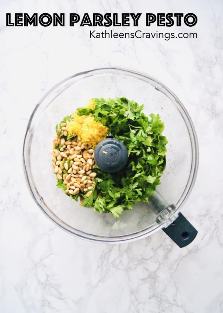 parsley, pesto, pine nuts, and lemon zest in a food processor