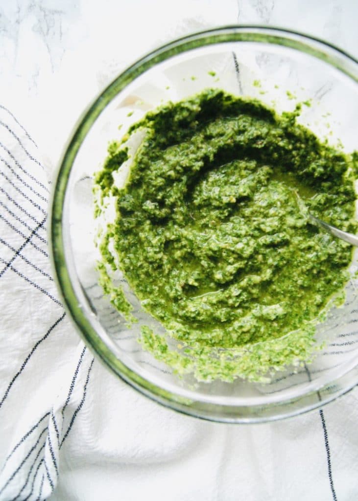 Parsley pesto in a glass bowl