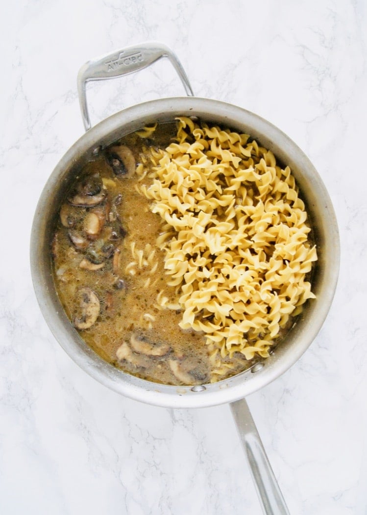 Adding noodles to beef stroganoff