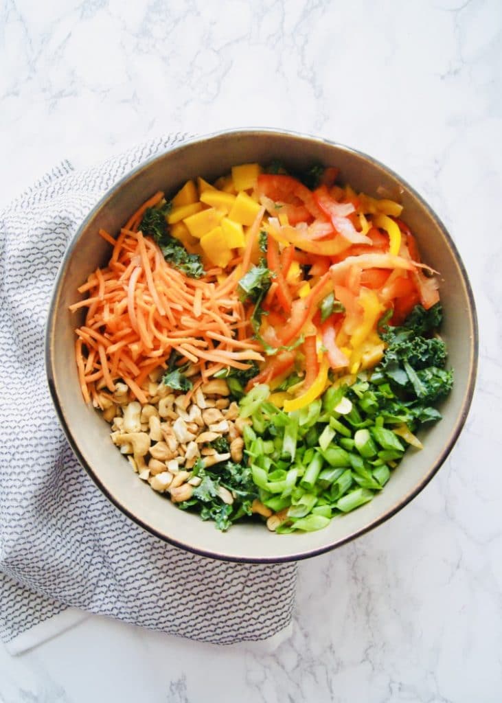 Thai salad ingredients in a large bowl