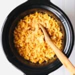 Slow Cooker Mac n Cheese is rich, creamy, and cheese. Just add the ingredients to your crock pot, stir together, and cook on low for a couple of hours. Recipe at KathleensCravings.com #kathleenscravings #macncheese #crockpotmacncheese #crockpot #slowcooker #pasta #cheese