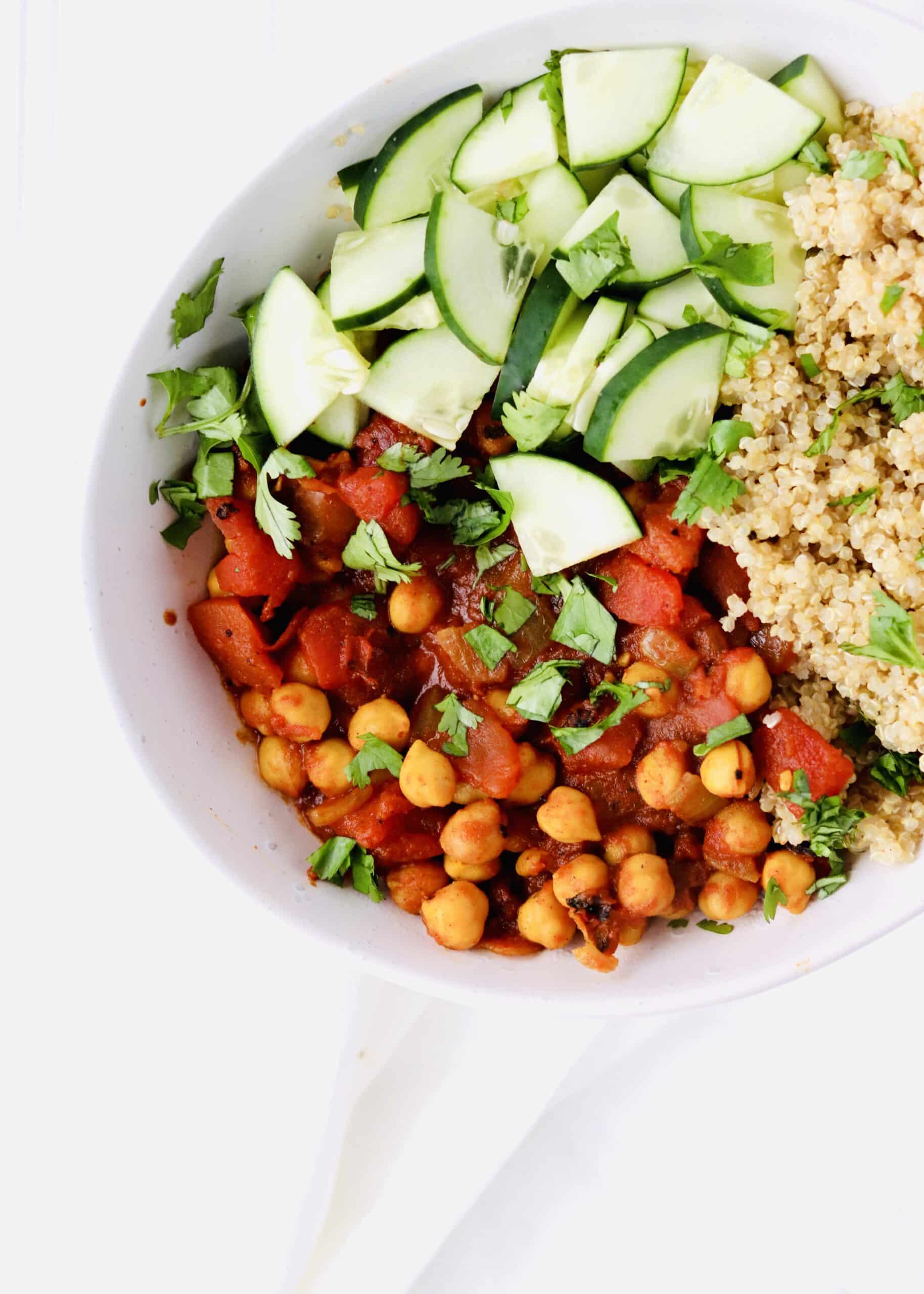 Moroccan Chickpea Bowls are perfect for your healthy eating goals. Plant based protein, clean ingredients, perfect for meatless Monday, easily made vegan, and made in just 30 minutes. Recipe at KathleensCravings.com #KathleensCravings #meatlessmonday #plantbased #cleaneating #vegetarian #vegan #chickpeas #quinoa
