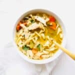 Made right in your pressure cooker - this Instant Pot Chicken Noodle Soup is perfect for chilly weather. Simple, comforting, and healthy. Recipe at KathleensCravings.com #kathleenscravings #instantpotsoup #chickenoodlesoup #chickennoodle #soupseason