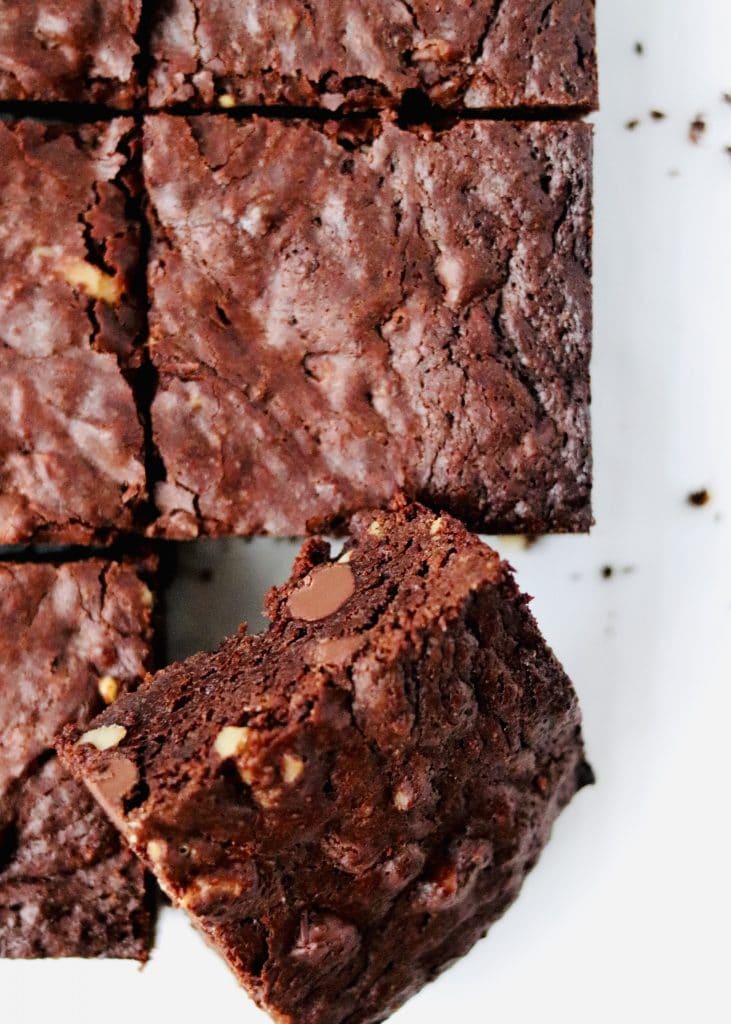 Cut fudgy brownies with chips and walnuts