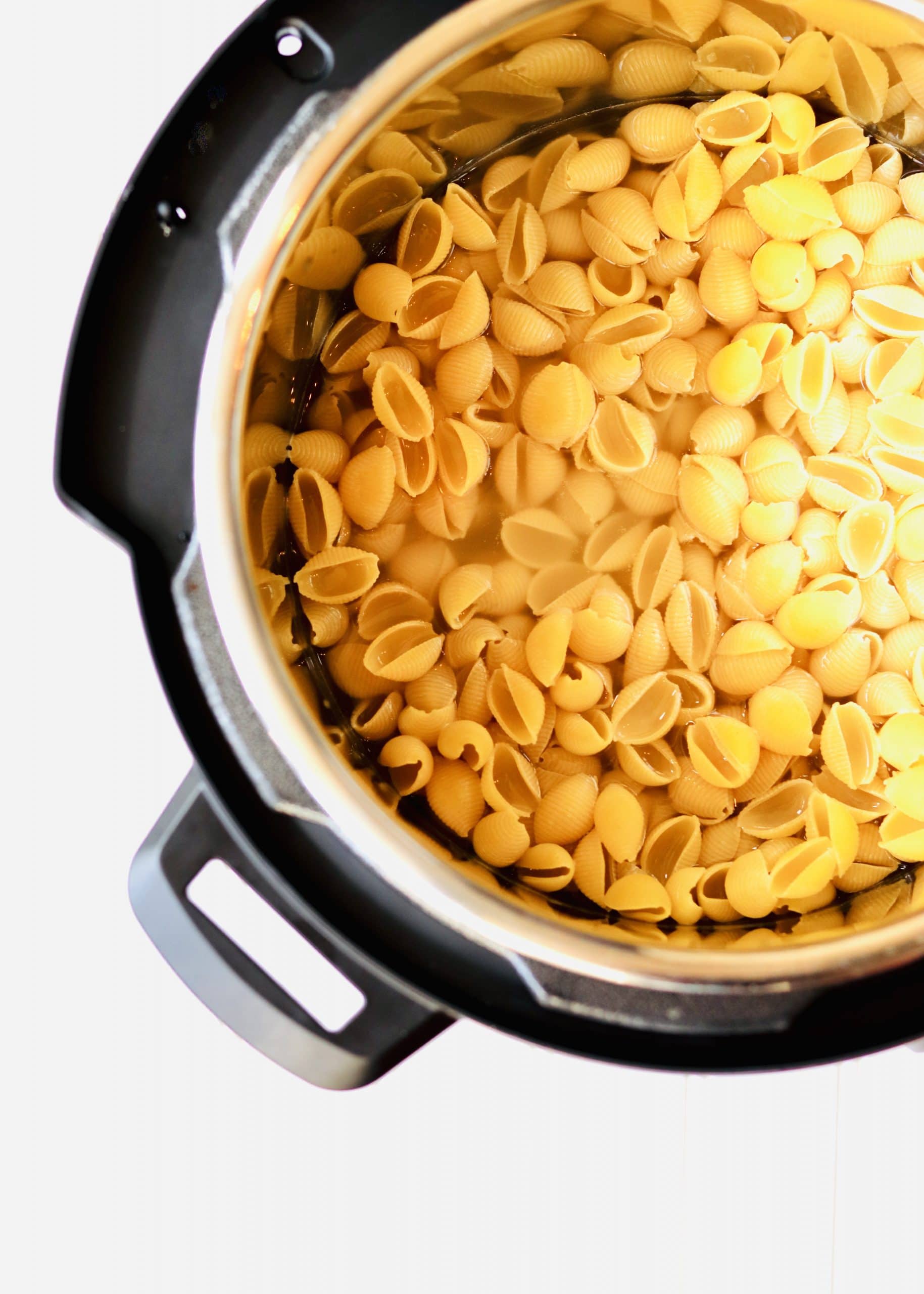 Elbow macaroni noodles in pressure cooker