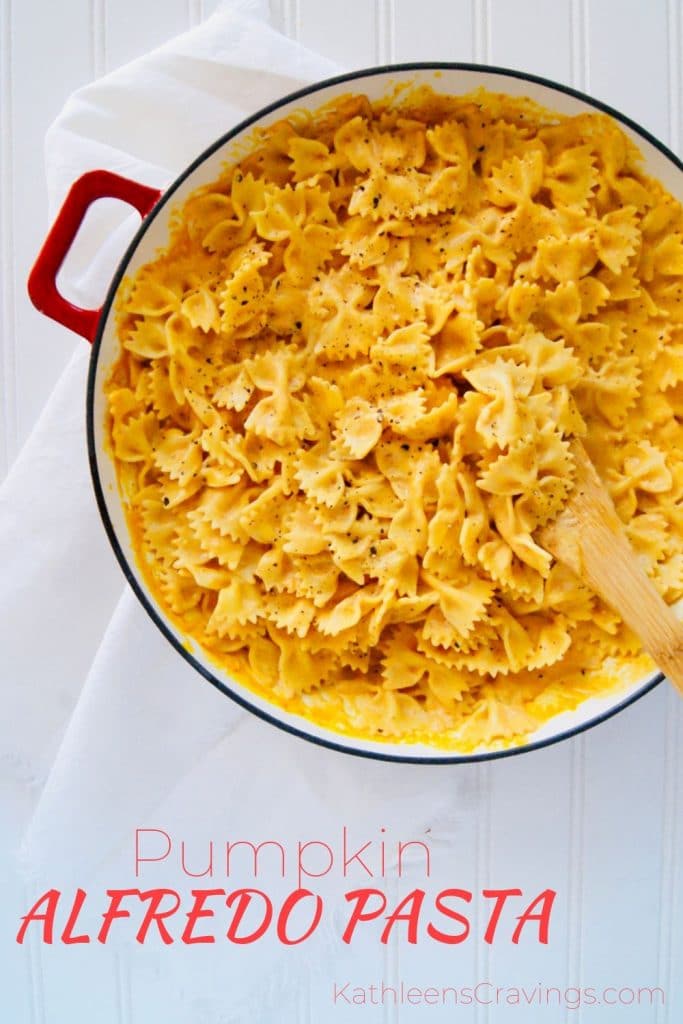 Pumpkin Alfredo Pasta in pan with text overlay