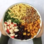 Vegan pasta salad ingredients in large bowl