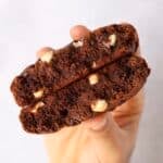 Hand holding a thick chocolate cookies