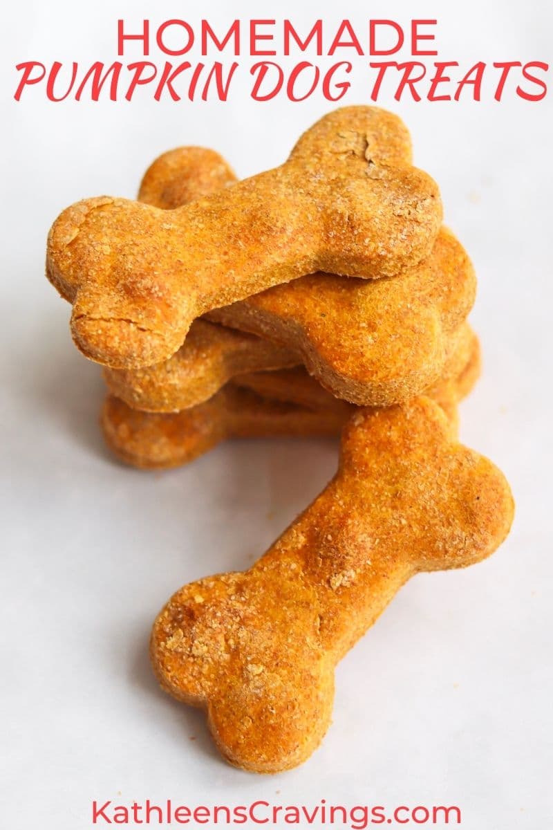 Stack of homemade peanut butter pumpkin dog treats in a bone shape