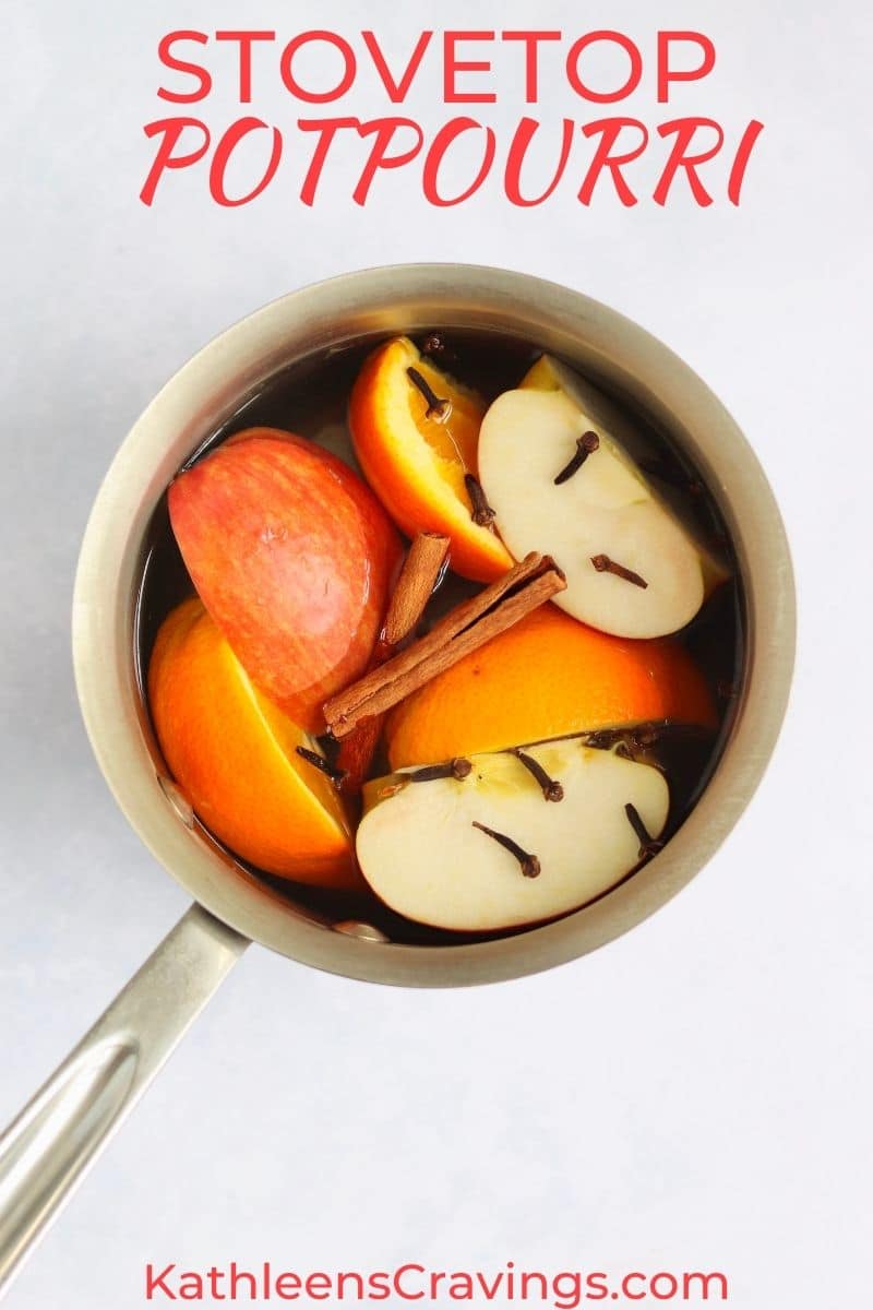 Simmer potpourri in a pot - apples, oranges, cinnamon sticks, and cloves.