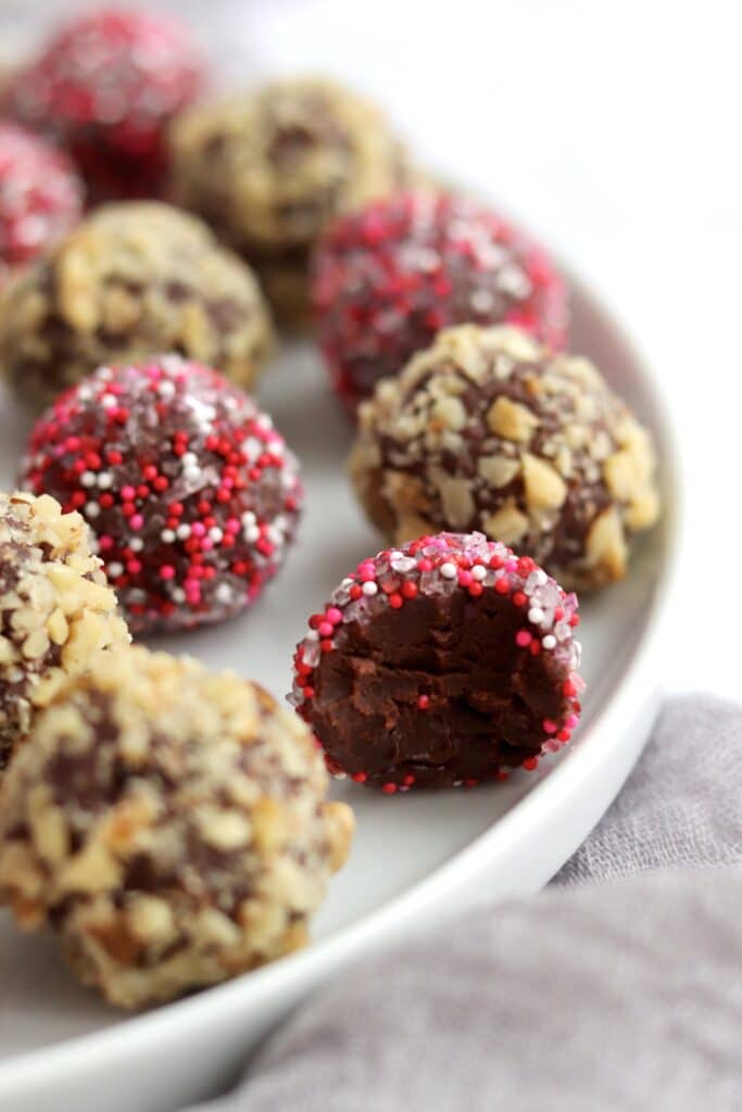 Plate of easy chocolate truffles with valentine sprinkles