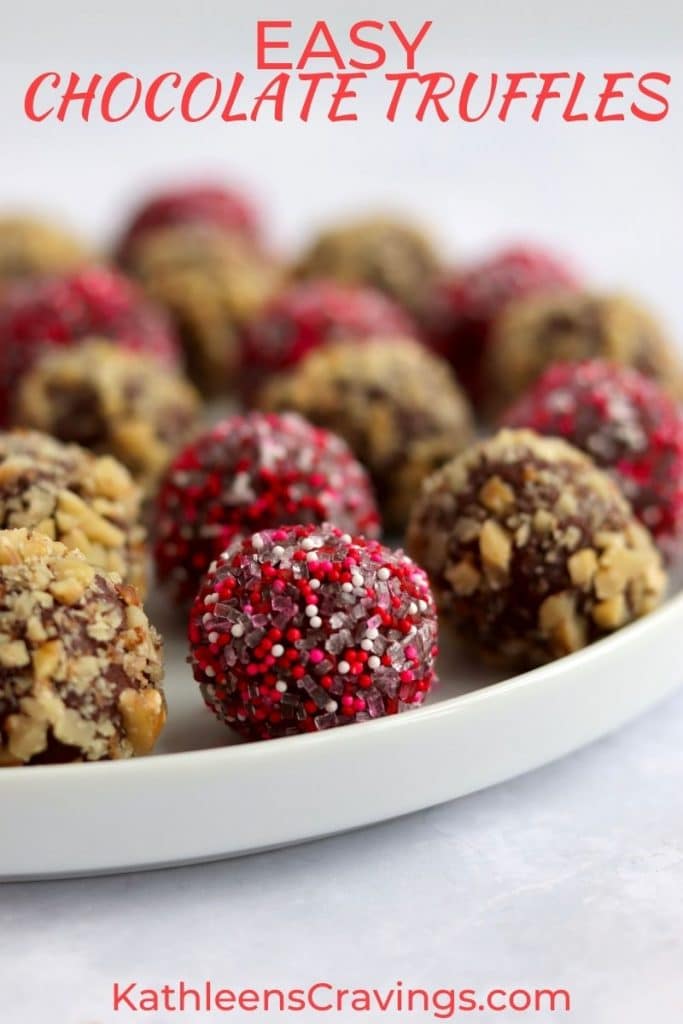 Plate of valentine chocolate truffles with sprinkles and chopped nuts