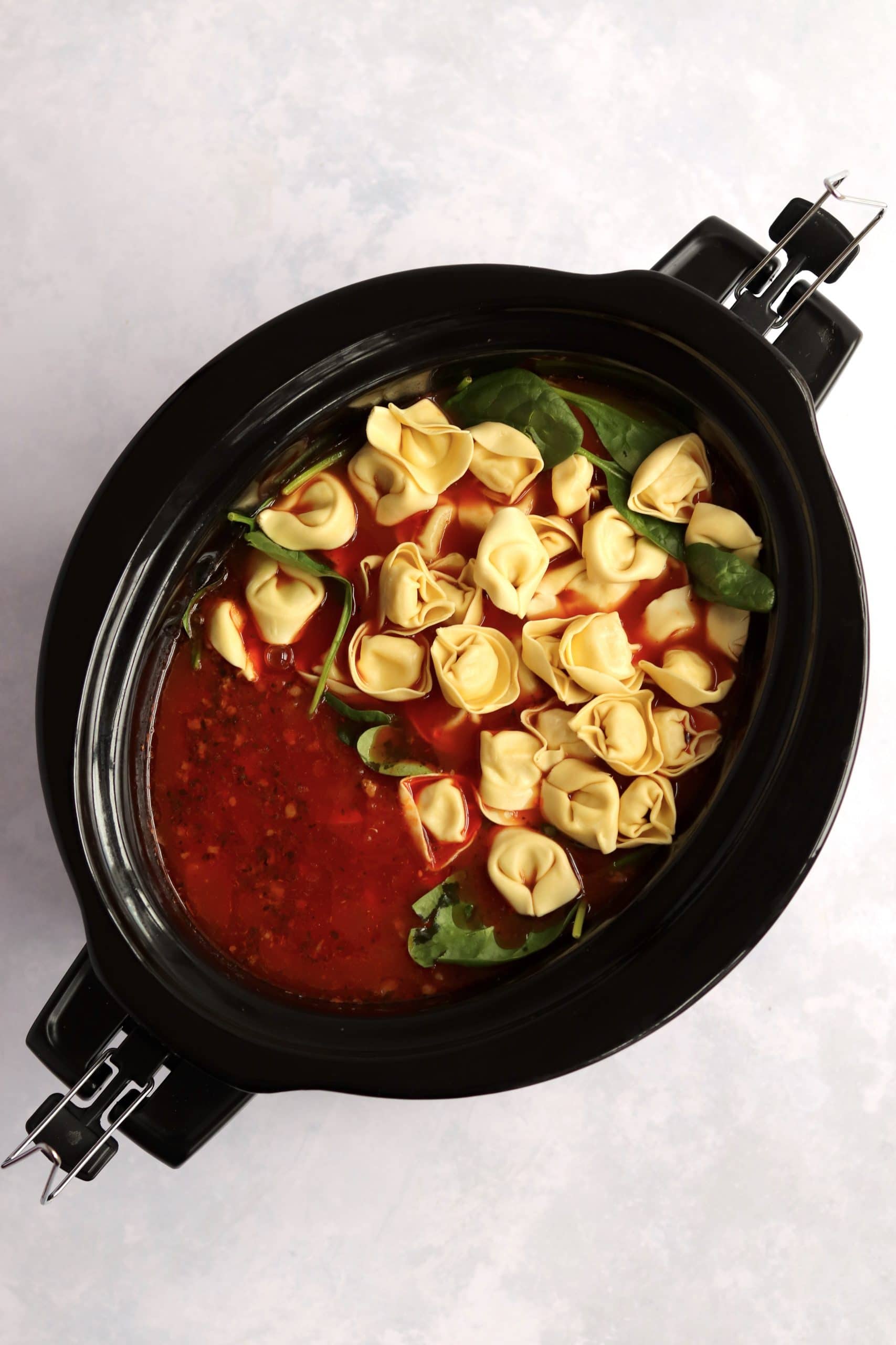 sausage soup with tortellini in a crockpot.