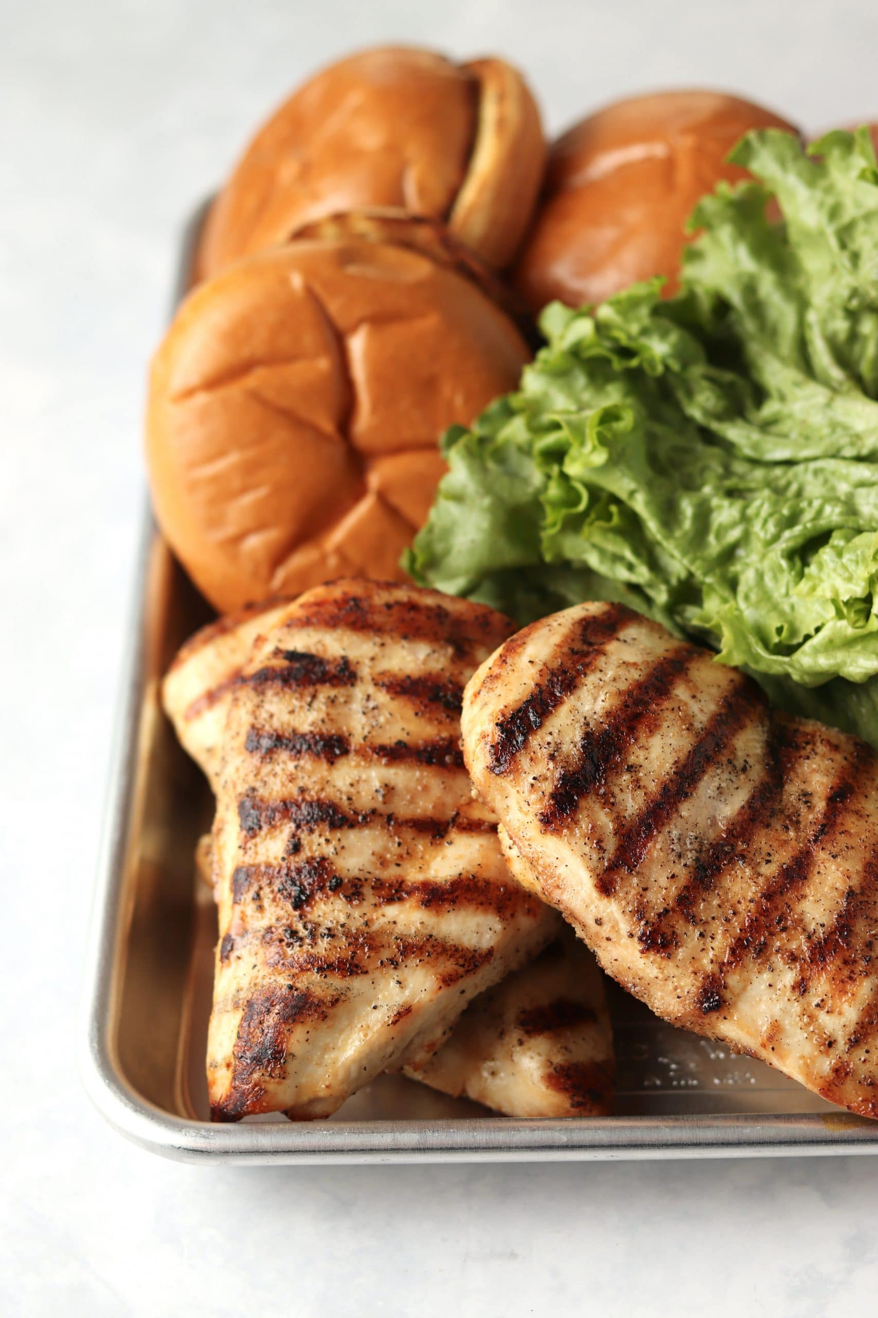 grilled chicken breasts and buns