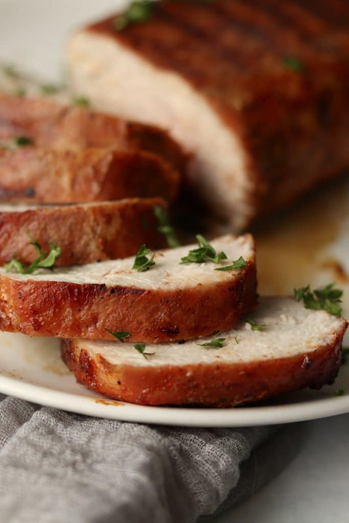 grilled pork tenderloin slices