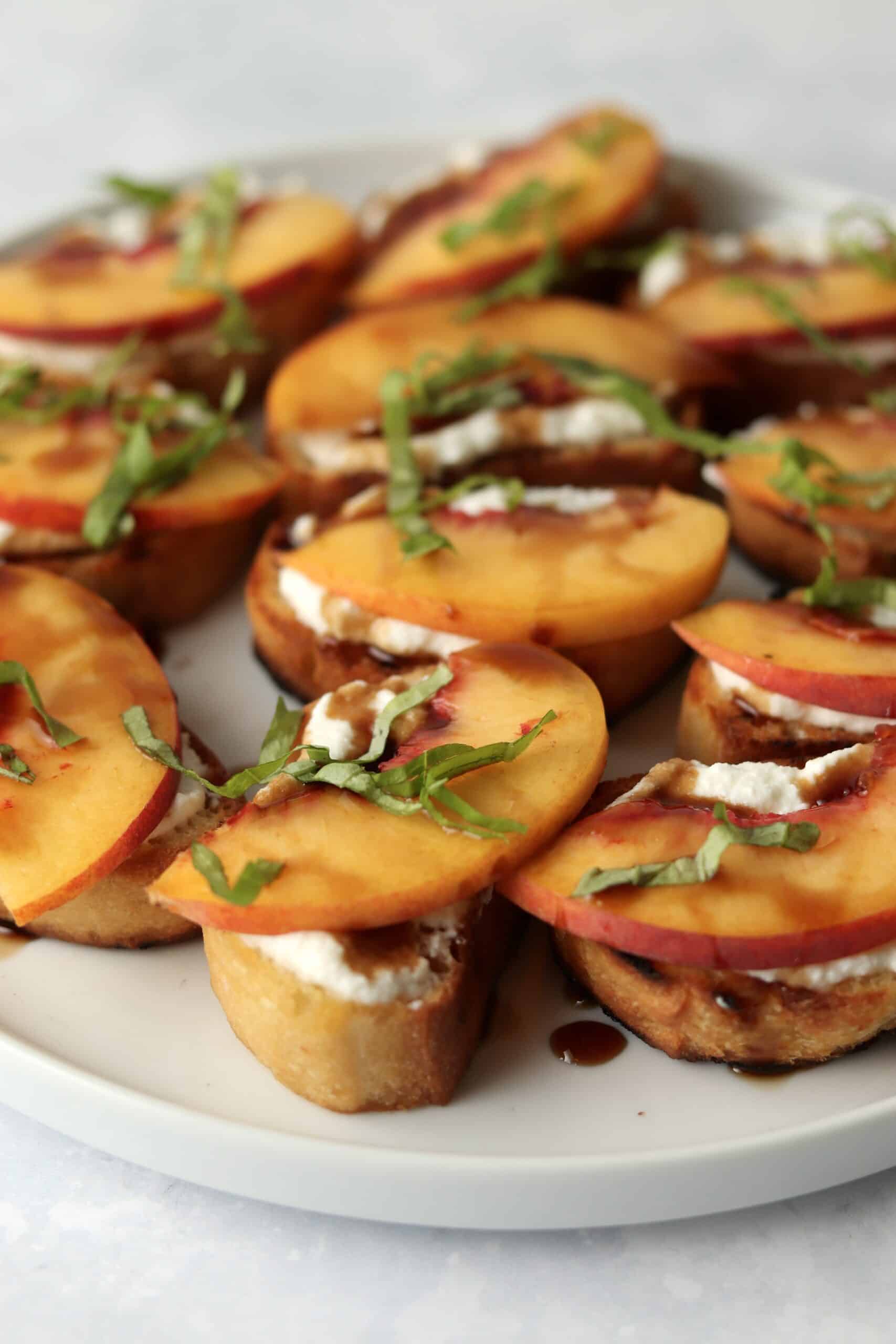 peach ricotta crostini appetizer on plate