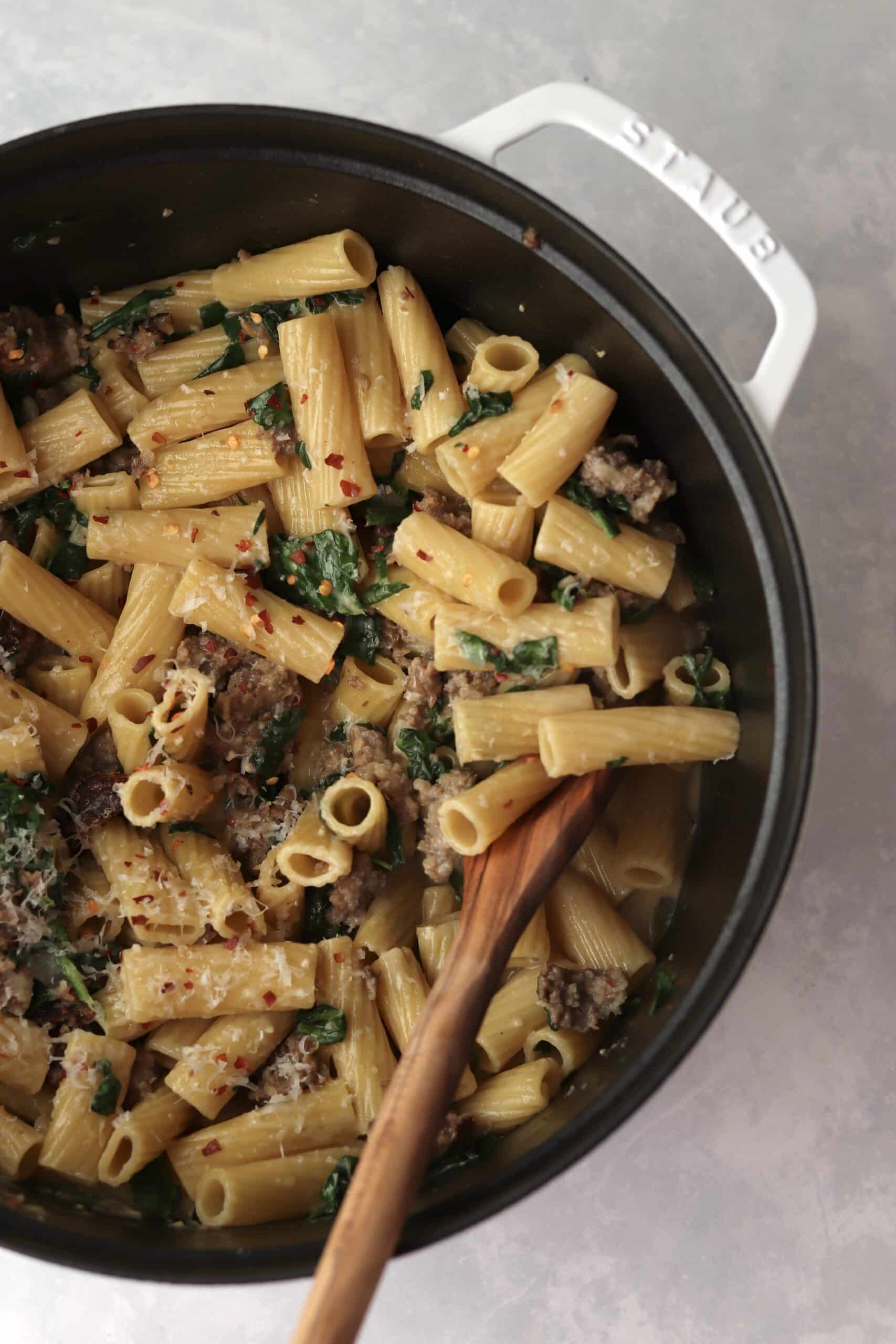 sausage spinach pasta in a dutch oven