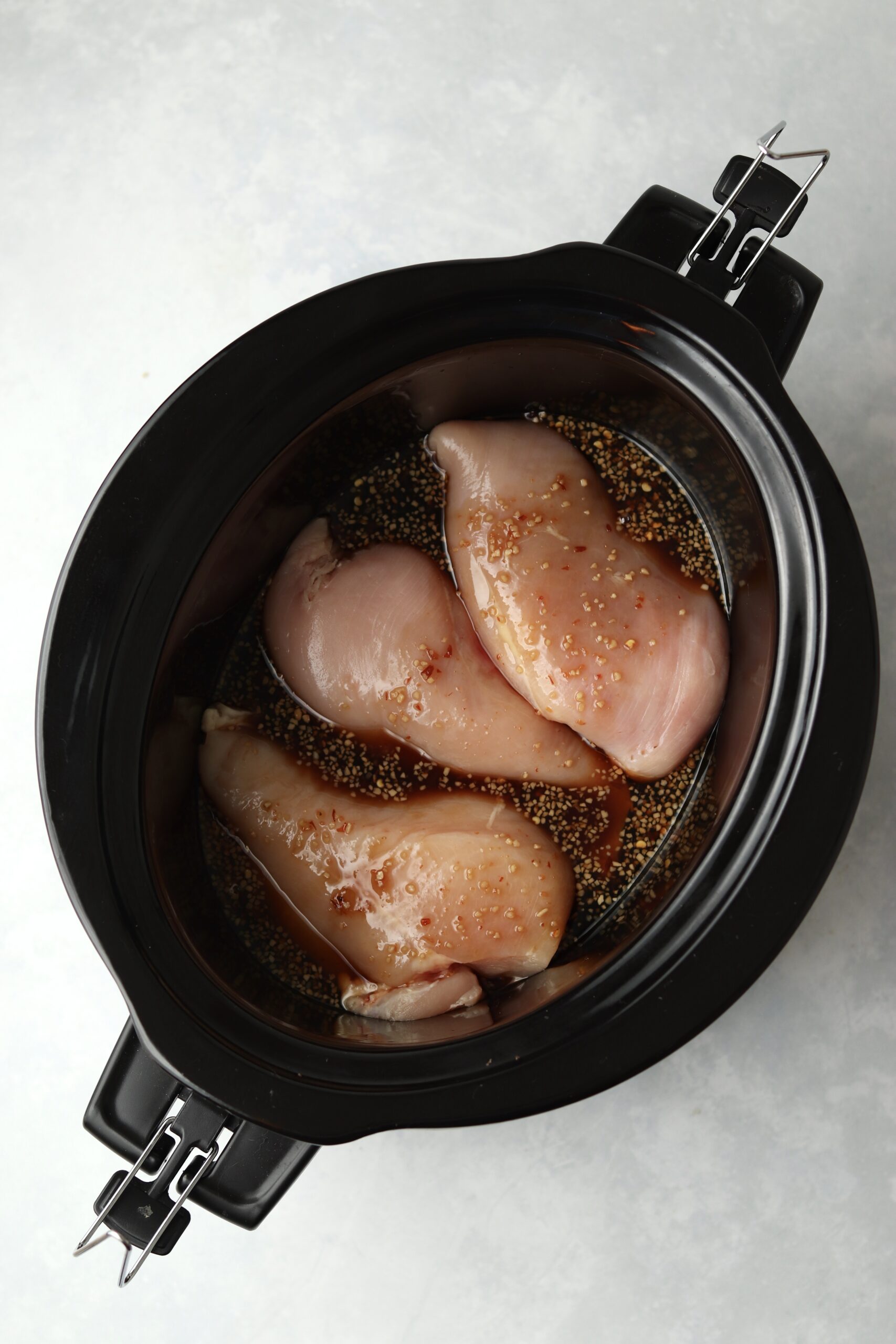 chicken breasts with teriyaki sauce in slow cooker