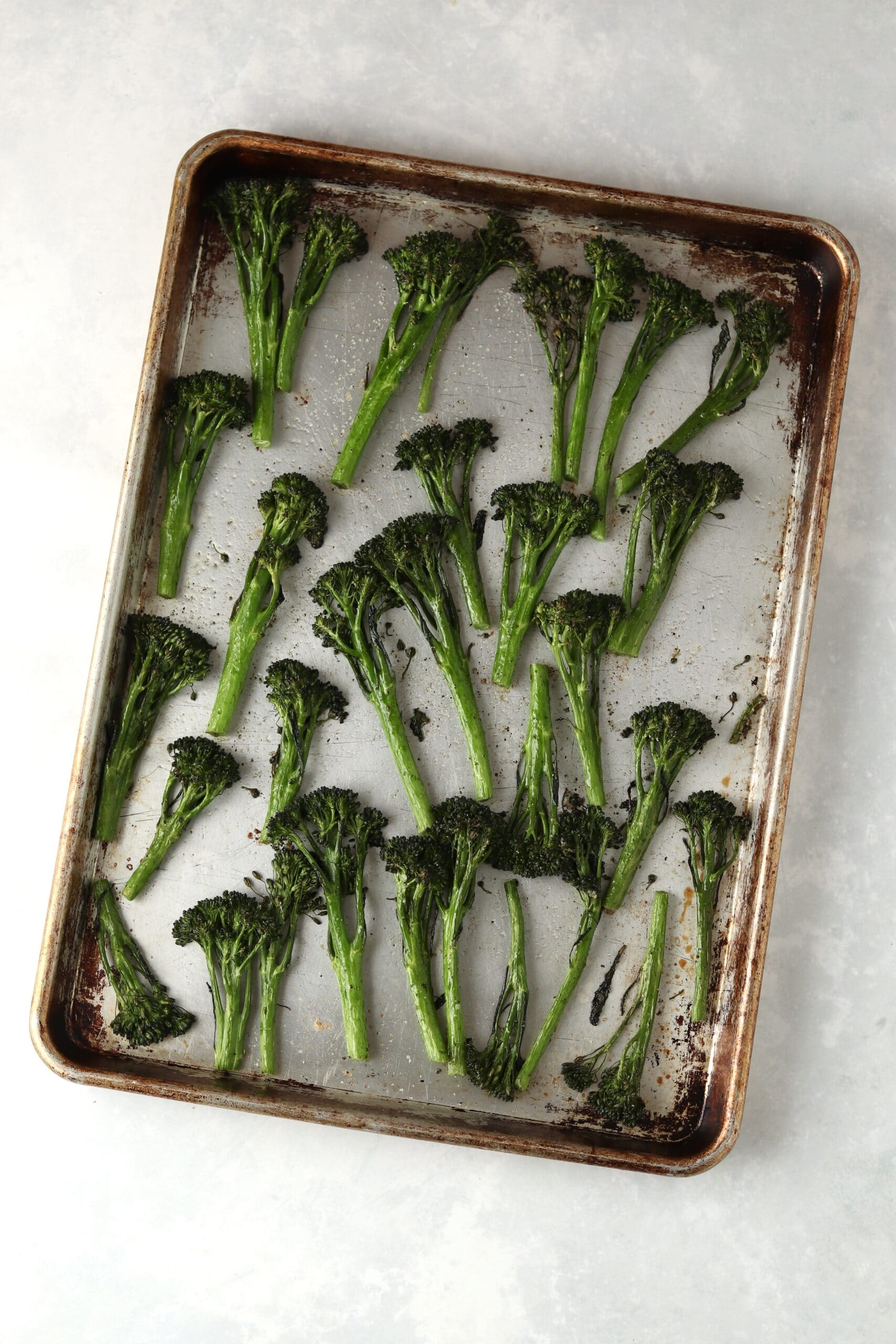 broccolini on a sheet pan after roasting
