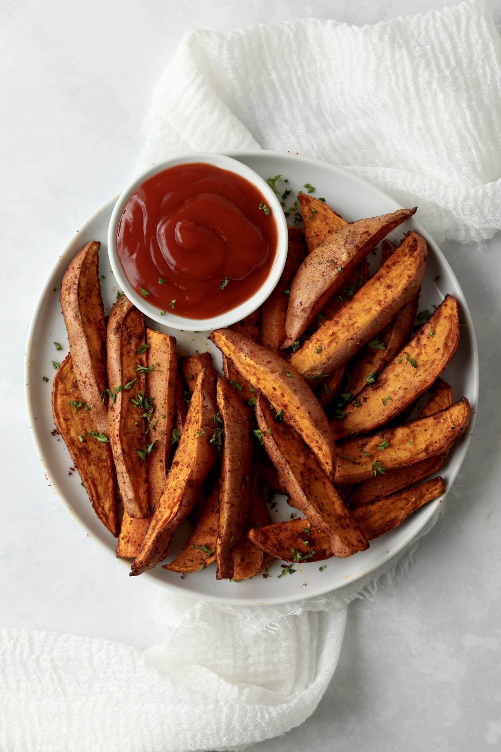 sweet potato wedges on a plate.