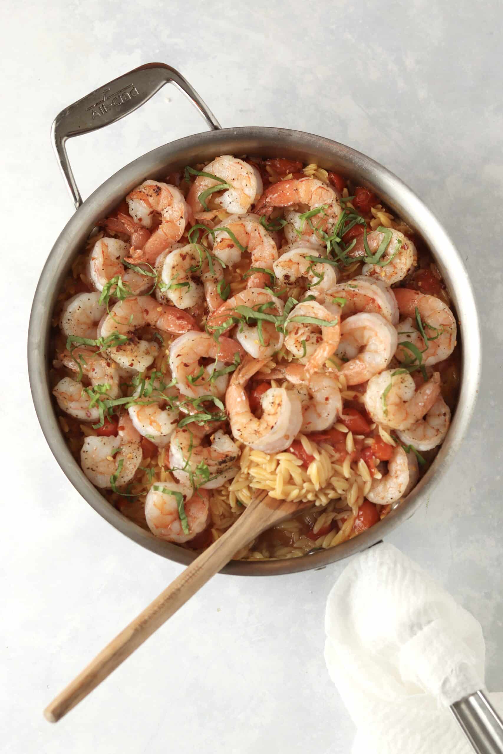 one pot shrimp and orzo in a deep sauté pan.