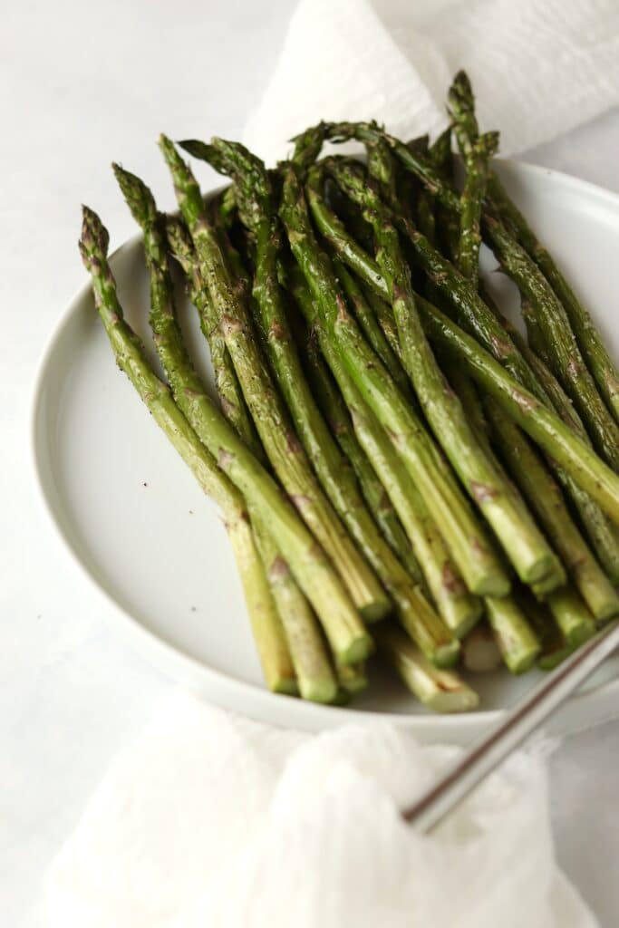 cooked asparagus on a plate