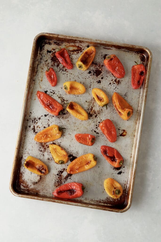 roasted mini peppers on a sheet pan