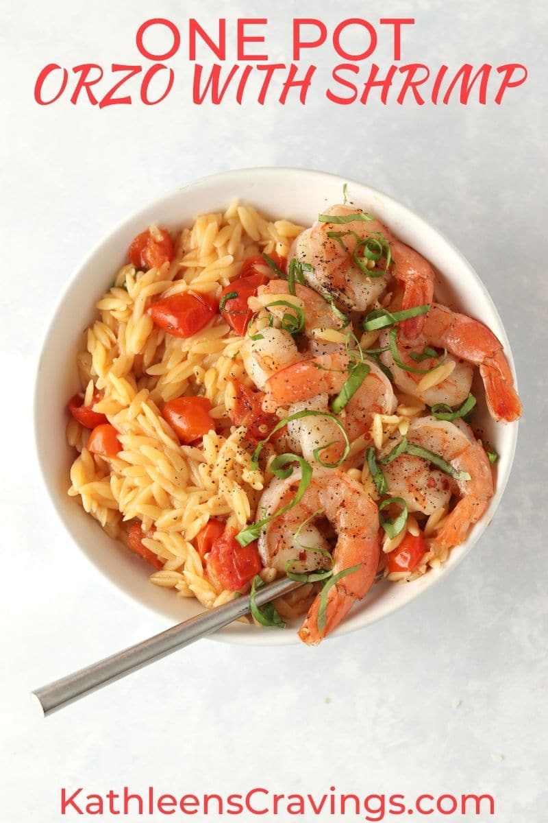 orzo with shrimp and tomatoes in a bowl