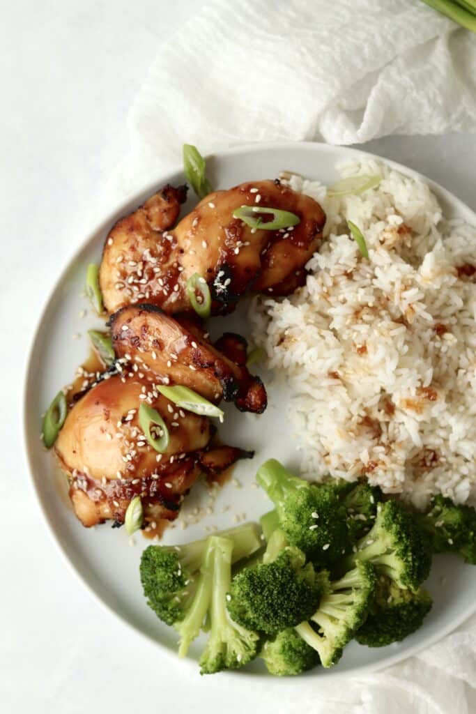 air fryer sesame chicken thighs with rice and veggies