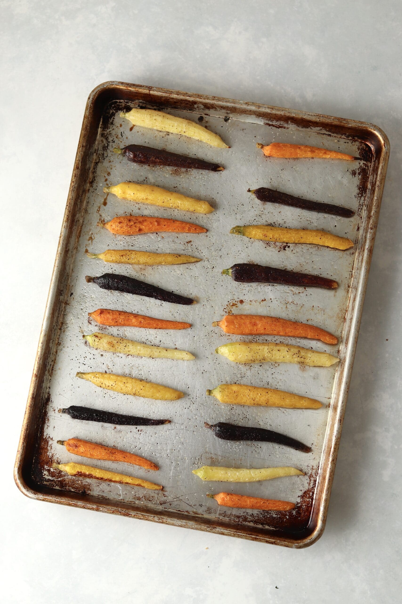 roasted rainbow carrots on sheet pan