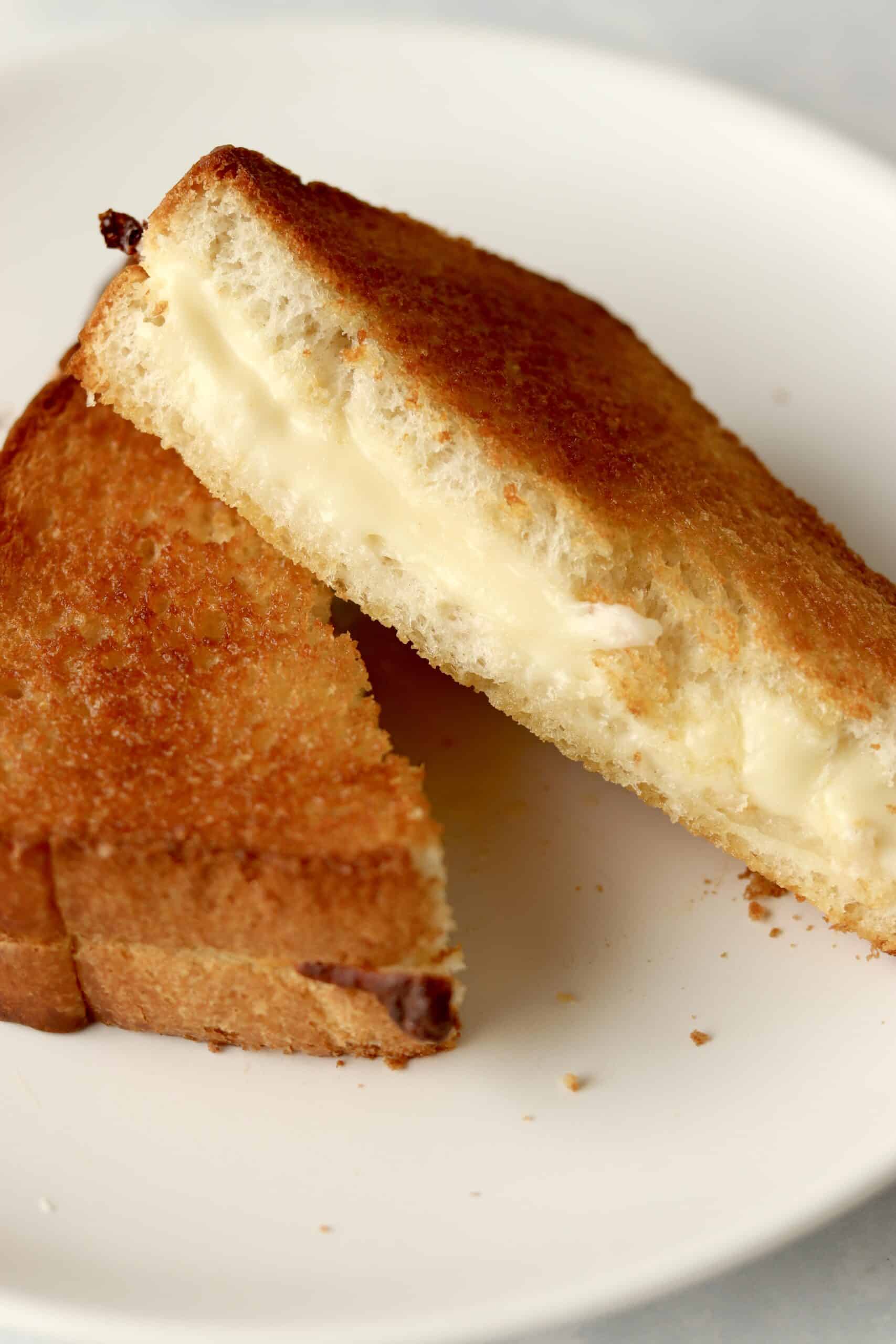 air fryer grilled cheese cut in half.