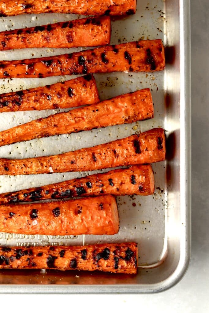 carrots with grill marks on a sheet pan