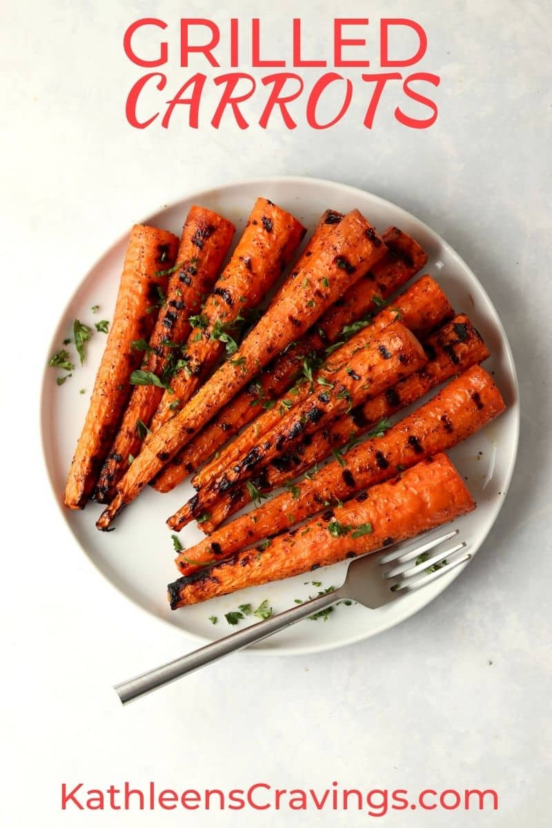 grilled whole carrots on a plate