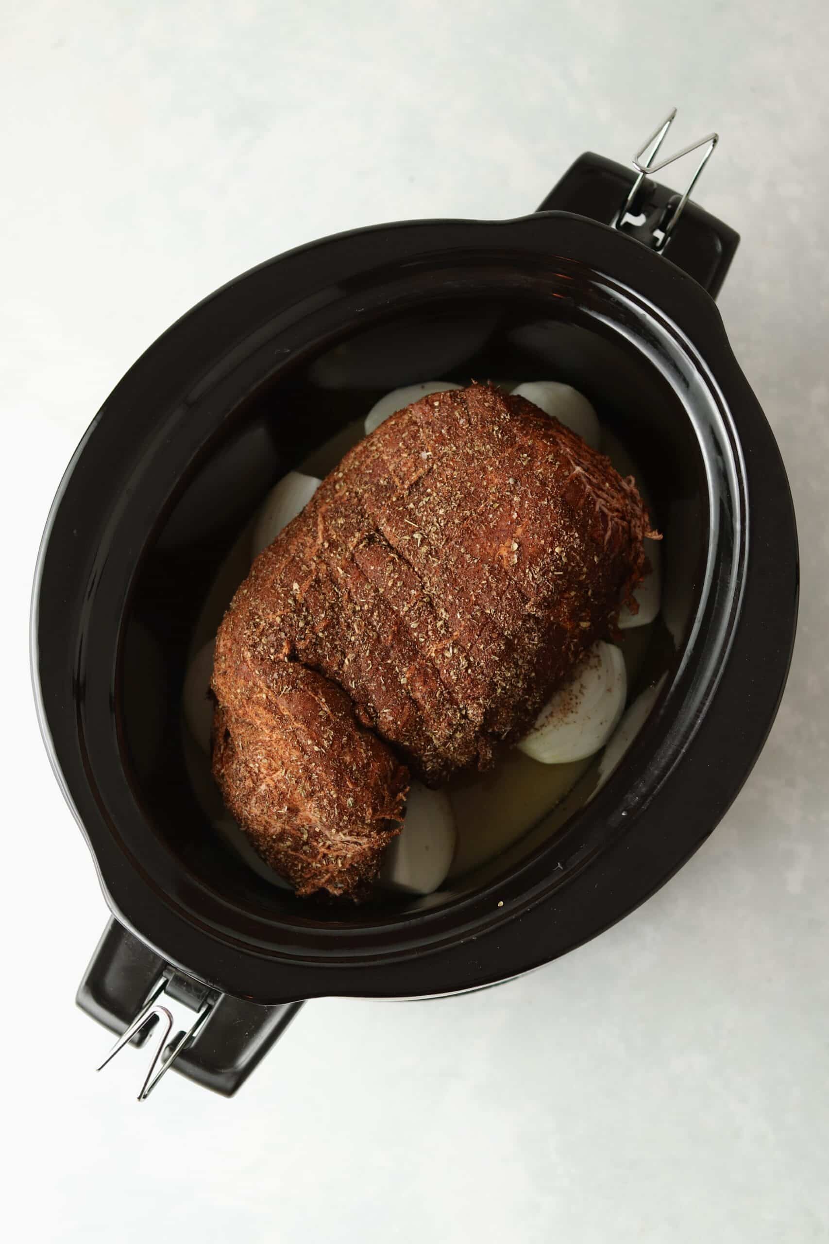 pork shoulder dry rubbed in slow cooker
