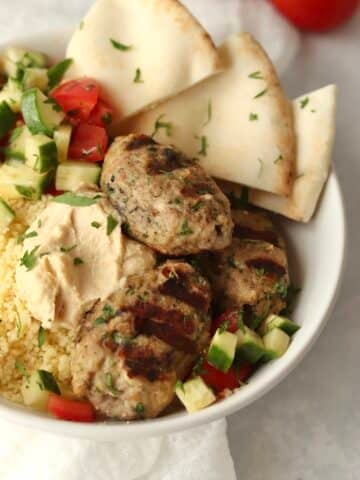 close up of ground chicken kofta with grill marks