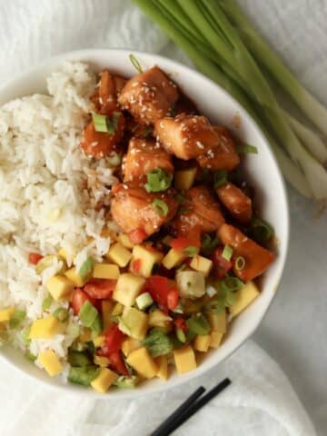 honey sriracha salmon with rice in a bowl
