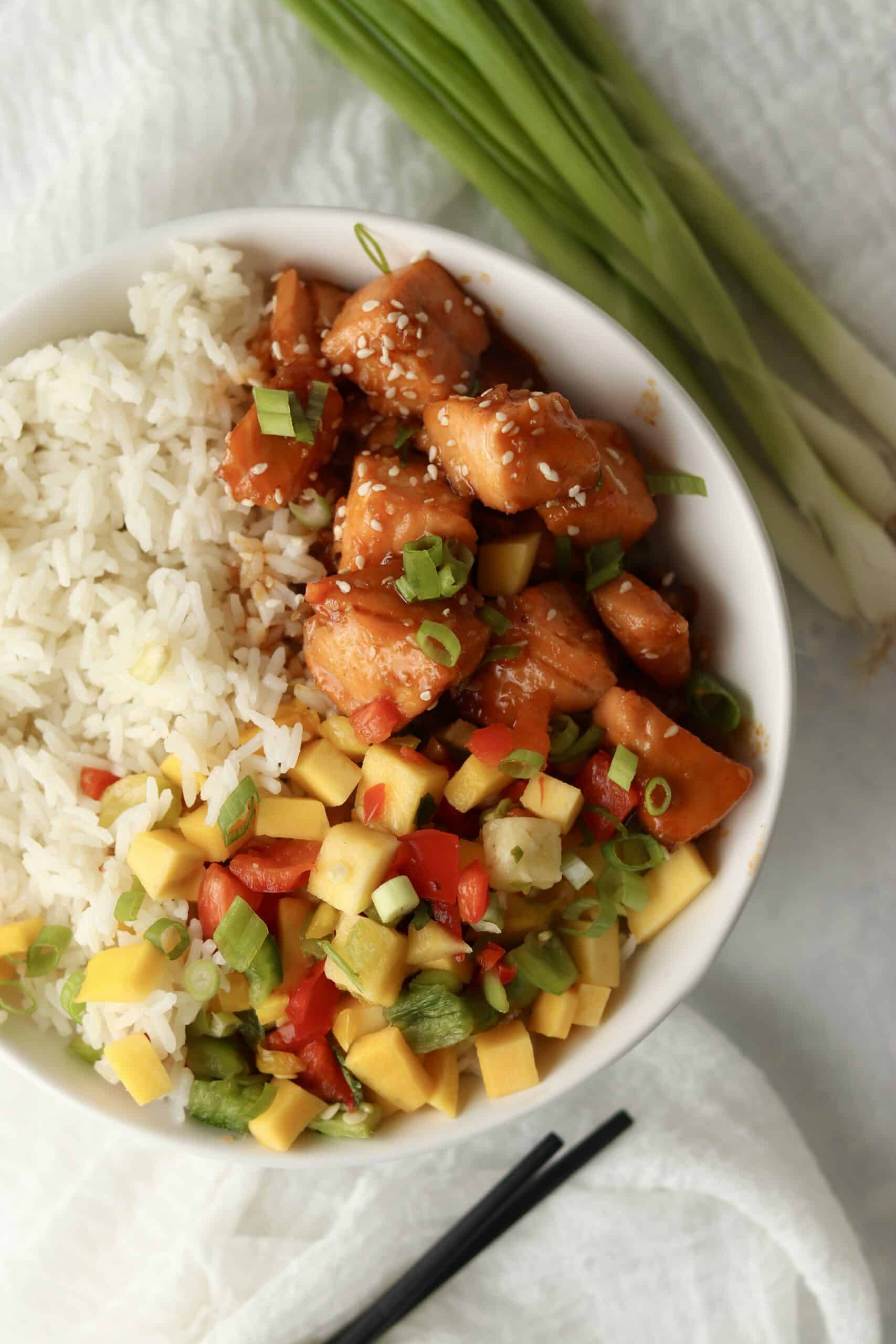 honey sriracha salmon with rice in a bowl