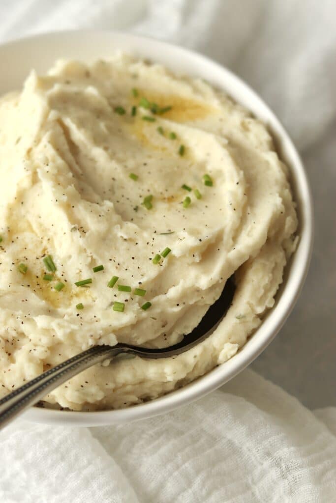 creamy Boursin cheese mashed potatoes in serving bowl