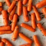 oven roasted brown sugar carrots on a sheet pan