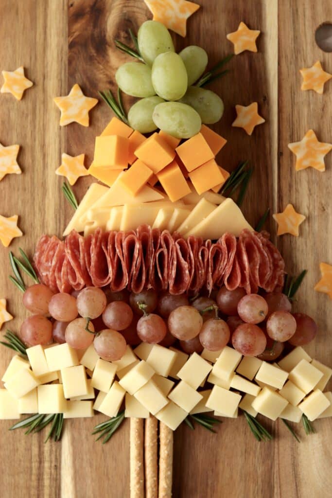 cheese and meat formed in the shape of a Christmas tree