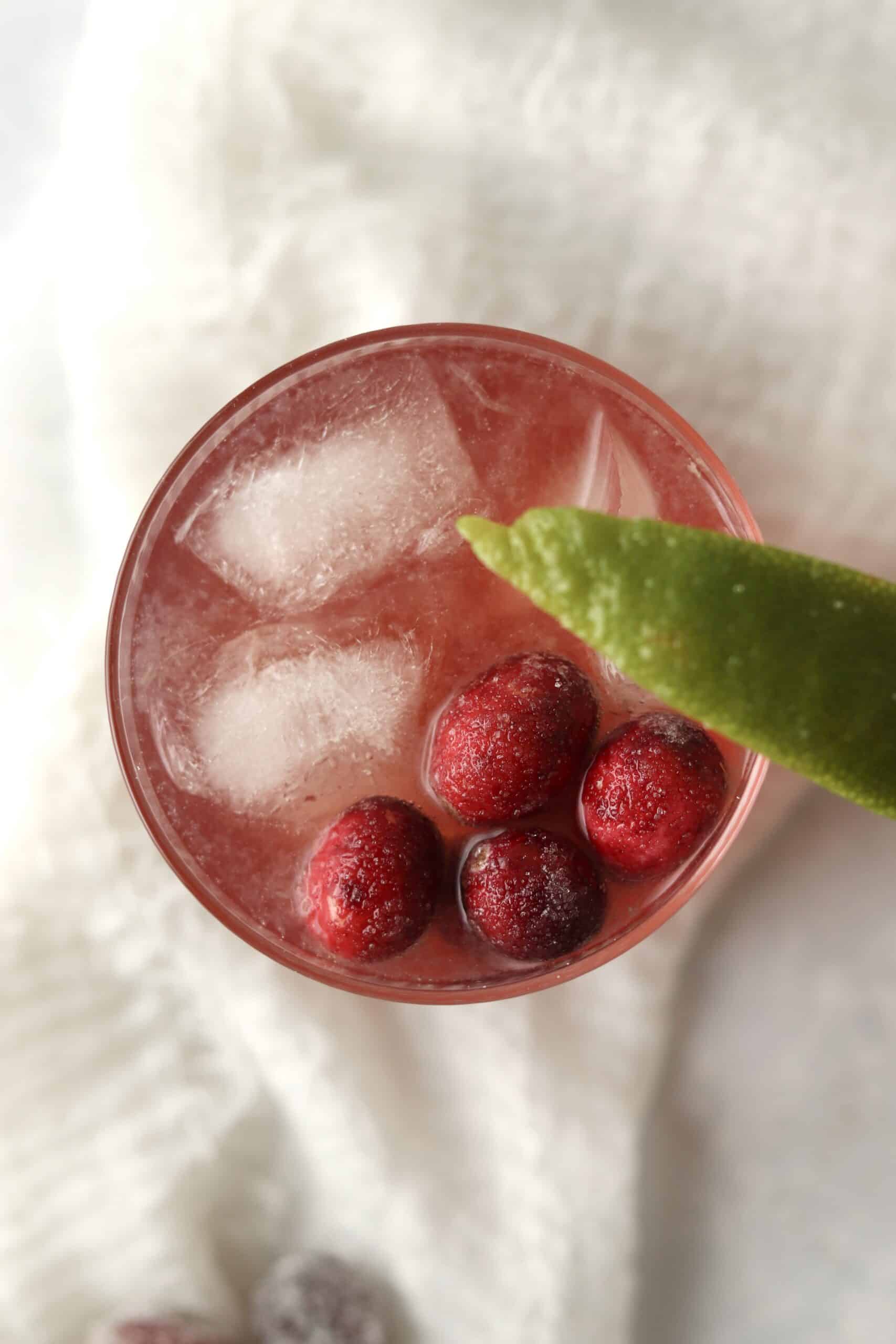 christmas cranberry cocktail with a lime
