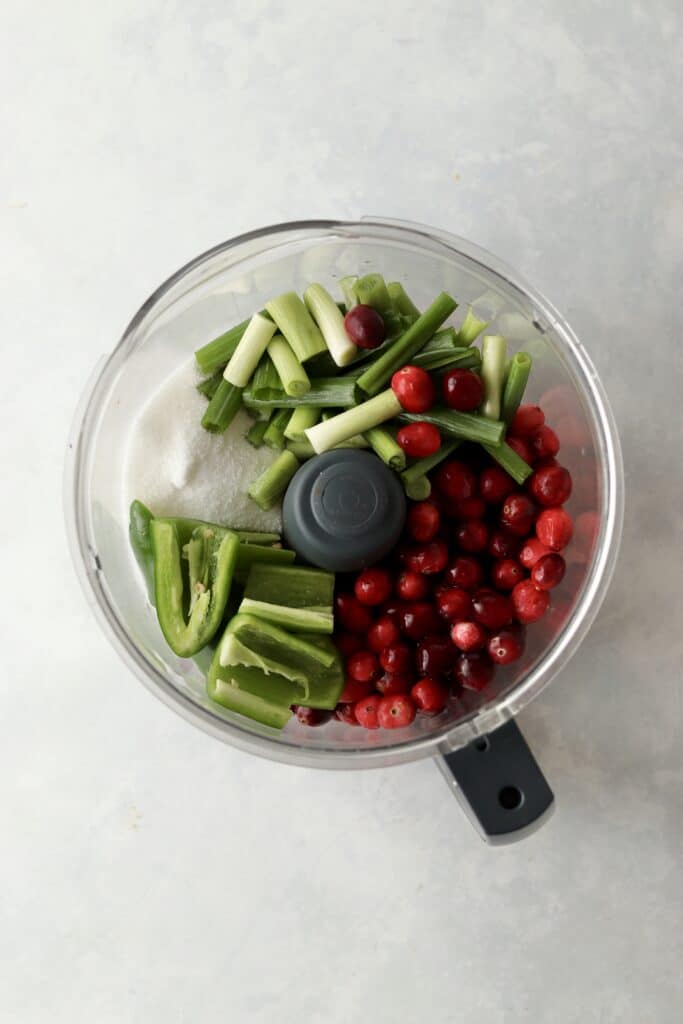 fresh cranberries, jalapeño, green onion, and sugar in a food processor