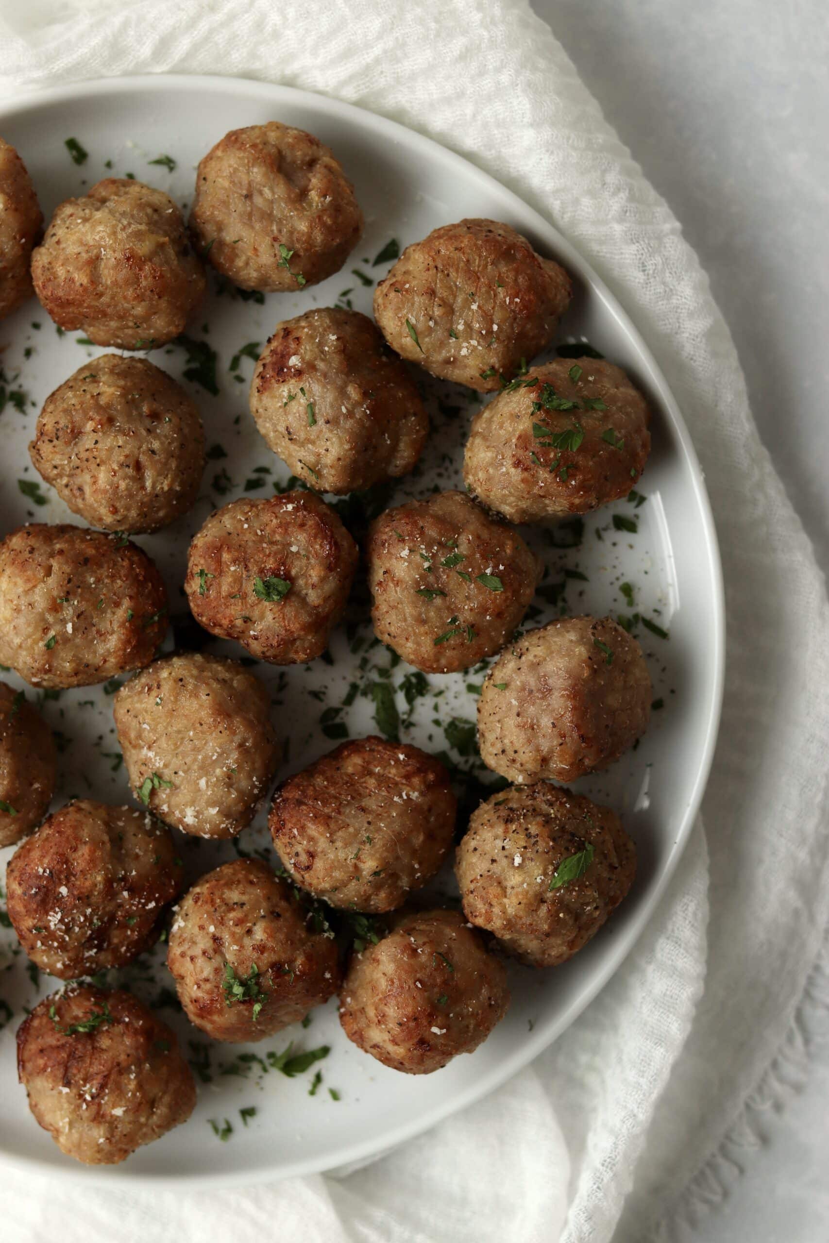 air fried turkey meatballs sprinkled with parmesan and parsley