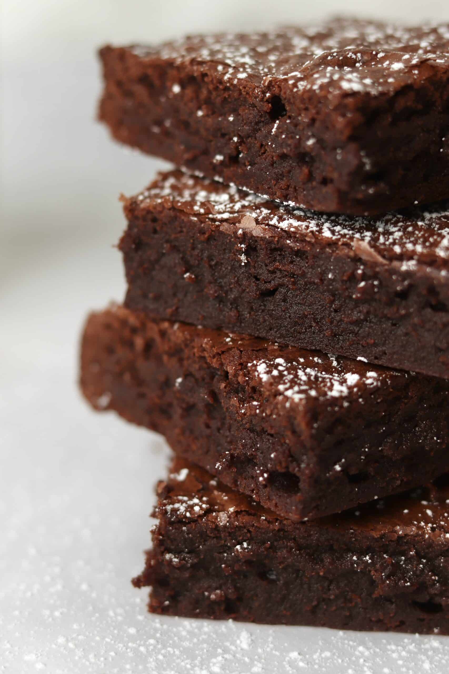 stack of fudgy brownies made with hot chocolate mix