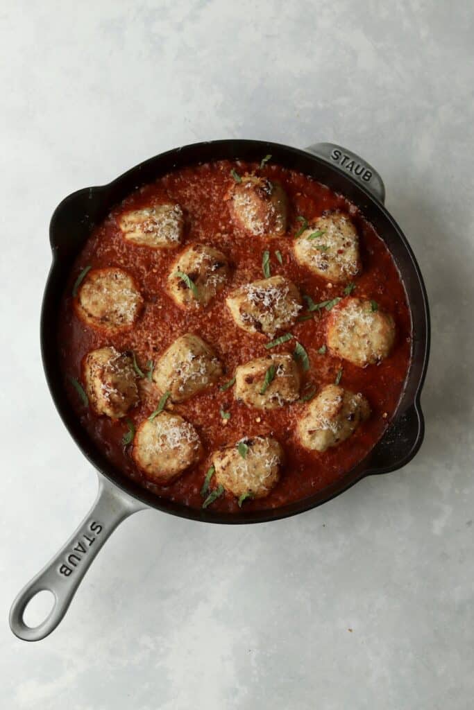 finished chicken meatballs in skillet