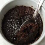 close up of spoon digging into Oreo mug cake