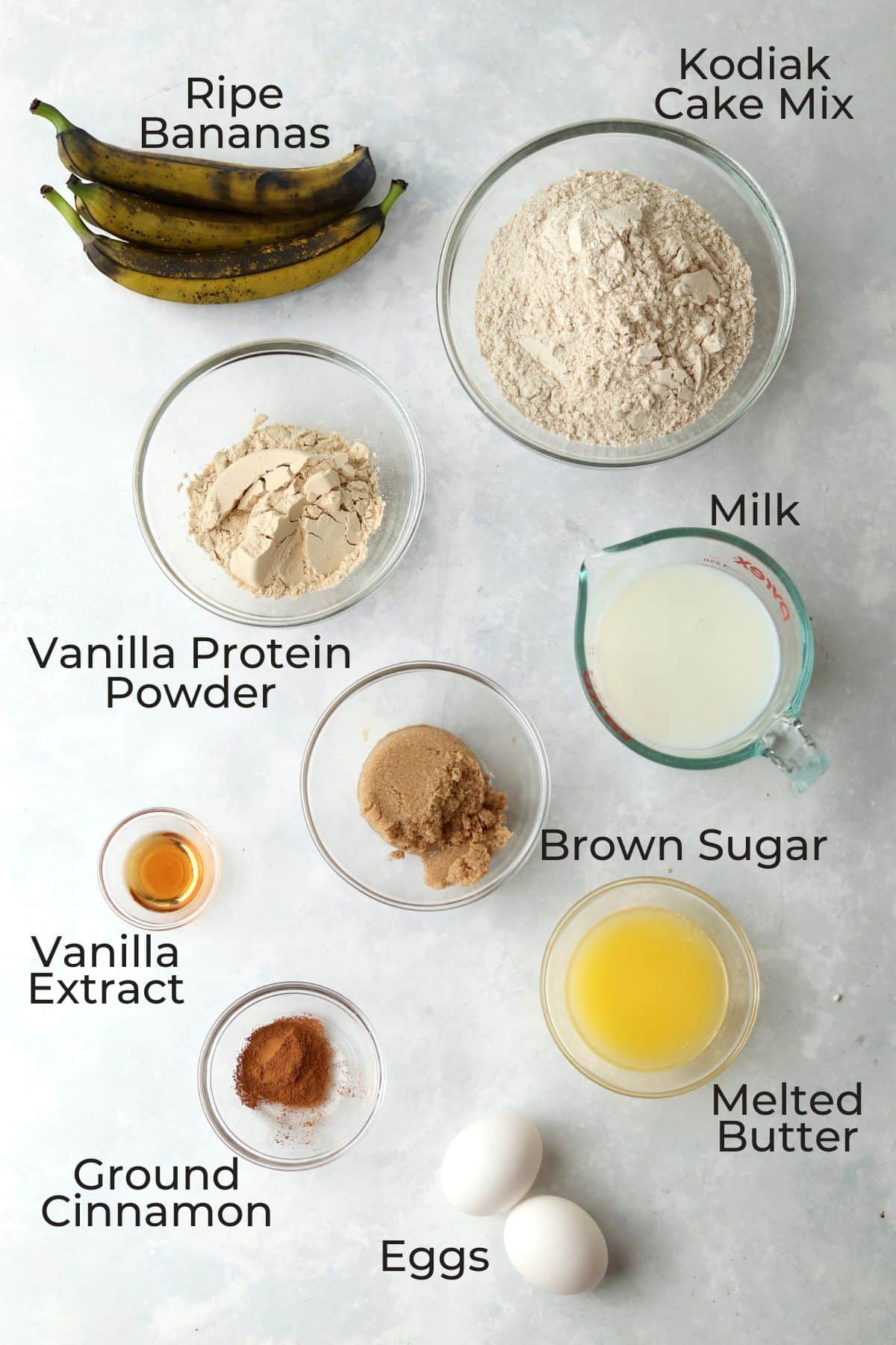 Kodiak protein muffin ingredients in prep bowls.