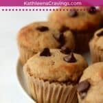 protein banana chocolate chip muffins on a plate with text overlay.